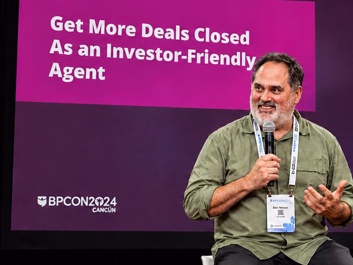 Dan Nelson speaking on stage at BPCon 2024 in Cancun